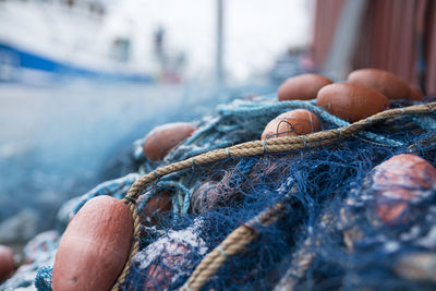 Close-up of fishing net at harbor