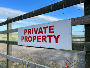 Private property sign on a fence