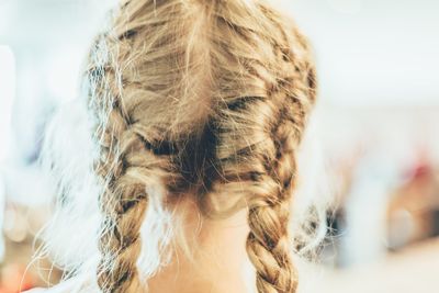 Rear view of girl with braided hair