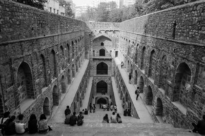 People in front of historical building