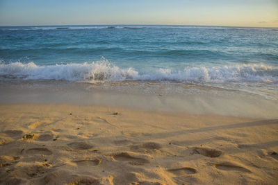 Scenic view of beach against sky