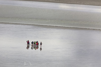 High angle view of people on shore at beach