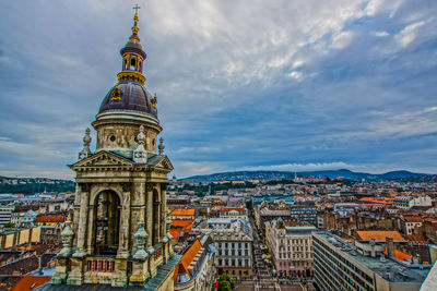 High angle view of buildings in city against sky