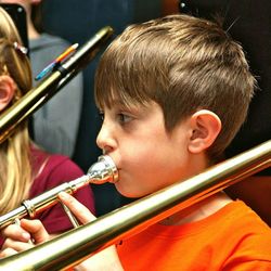 Boy playing trombone