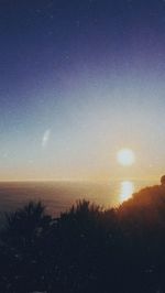 Scenic view of silhouette landscape against sky during sunset