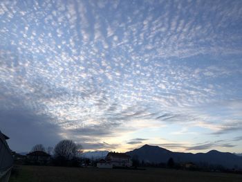 Scenic view of silhouette landscape against sky during sunset