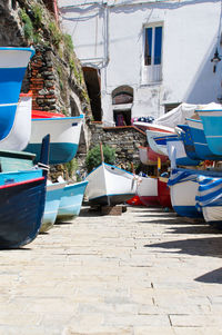 Row of boats moored at harbor