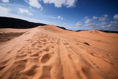 Scenic view of desert against sky