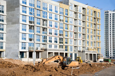 View of construction site by building