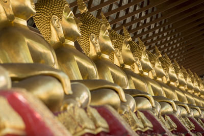 Golden buddha statues in temple