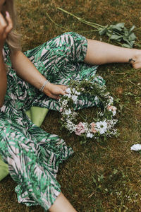 Woman making floral wreath