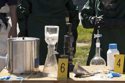 Close-up of wine bottles on table