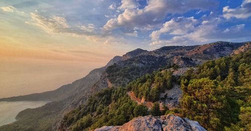 Scenic view of mountains against sky during sunset