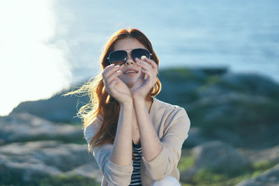 Portrait of woman wearing sunglasses