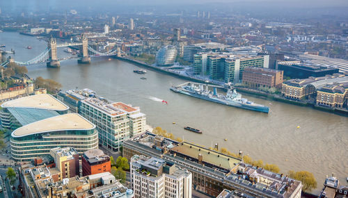 High angle view of river amidst buildings in city