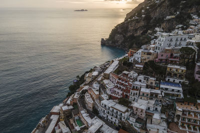 Aerial view of townscape by coast