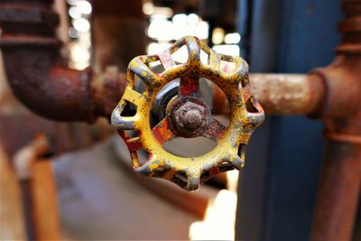 A rusty gas tap in an old abondoned industrial building.  