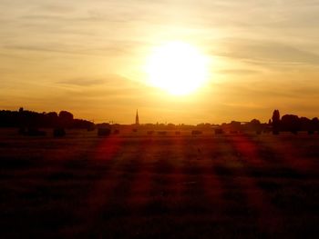 Scenic view of landscape at sunset