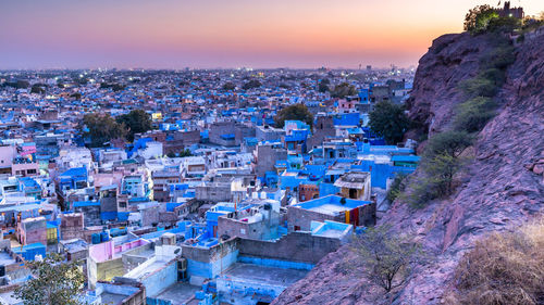 High angle view of townscape against sky at sunset