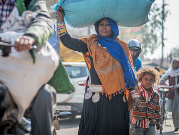 People on street in city