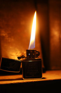 Close-up of illuminated candle