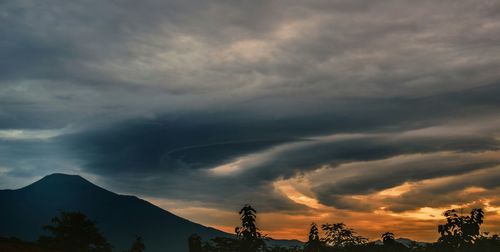 Low angle view of cloudy sky during sunset