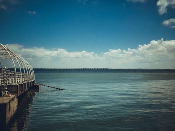 Scenic view of sea against blue sky