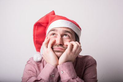 Portrait of man against white background