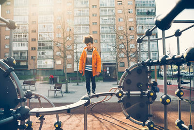 Cute boy enjoying in playground