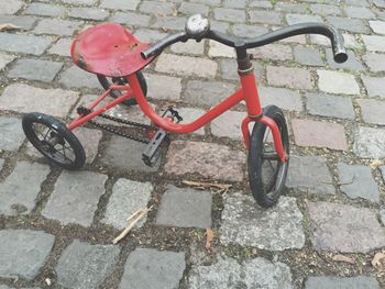 Close-up of red motor scooter