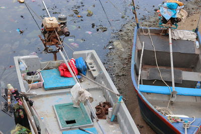 High angle view of fishing boats moored in water