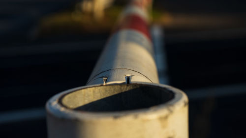 Close-up of pipe on wood