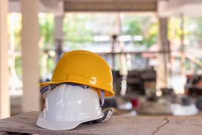 Hardhats on table in old building