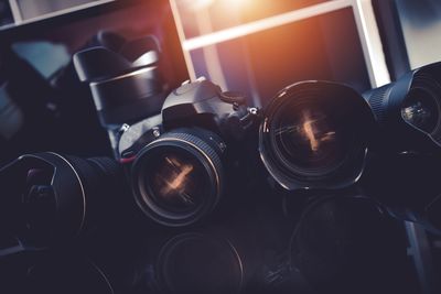 Close-up of cameras on table