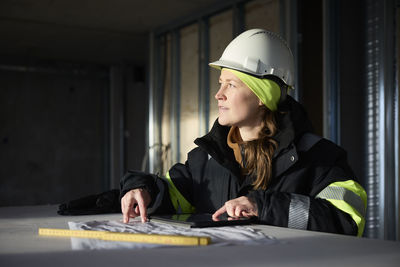 Female engineer at building site