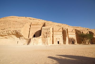 View of old ruins against blue sky