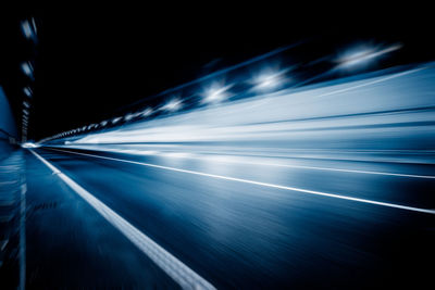 Light trails on illuminated city at night