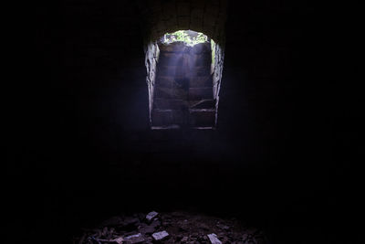 Low angle view of illuminated window in building