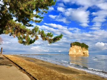 Scenic view of beach against sky