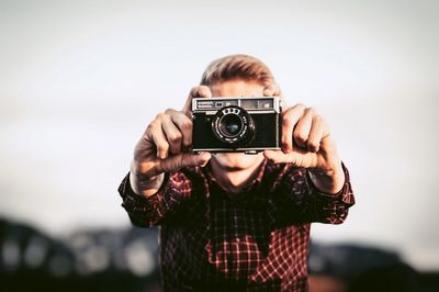 Portrait of man photographing