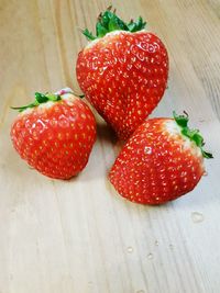 High angle view of strawberries on table