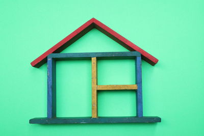 Close-up of house against blue background