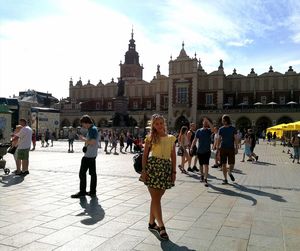 People at town square against sky