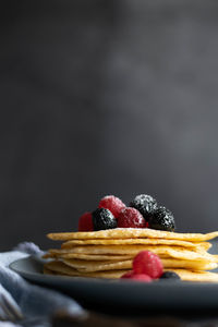 Homemade crepes on table, dark food photography, space for text