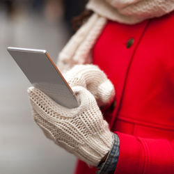 Close-up of woman holding mobile phone
