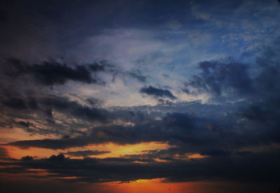 Low angle view of dramatic sky during sunset