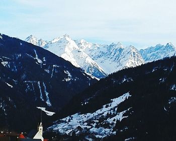 Scenic view of snow covered mountains