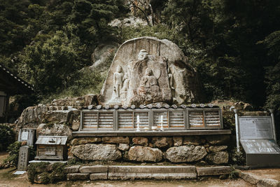 View of statue against trees