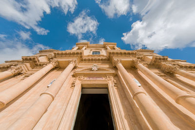 Low angle view of old building against sky