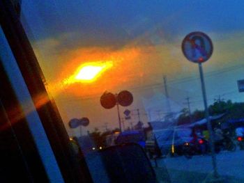 Reflection of sky on wet glass window